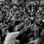Picture of protesters holding their cellphones with their lanterns on in a Black Lives Matter Protest in Washington DC on June 3rd, 2020.